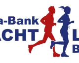 Sparda-Bank Nachtlauf Bonn: Läufer in Rot und Blau rennen durch die Nacht.