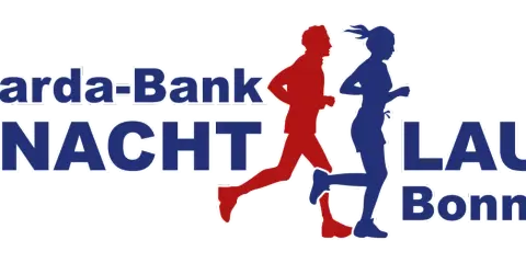 Sparda-Bank Nachtlauf Bonn: Läufer in Rot und Blau rennen durch die Nacht.