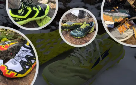 Verschiedene trailrunning schuhe zum joggen geeignet, teils schlammig, teils auf Schnee und Steinen liegend.