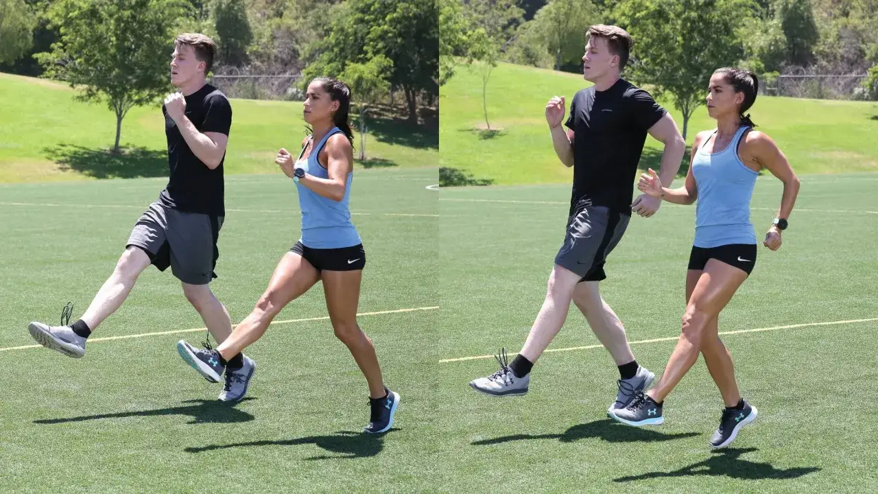 Ein Mann und eine Frau machen auf einem gr&uuml;nen Feld weite strides laufen. Sie tragen Sportkleidung und sind in Bewegung.